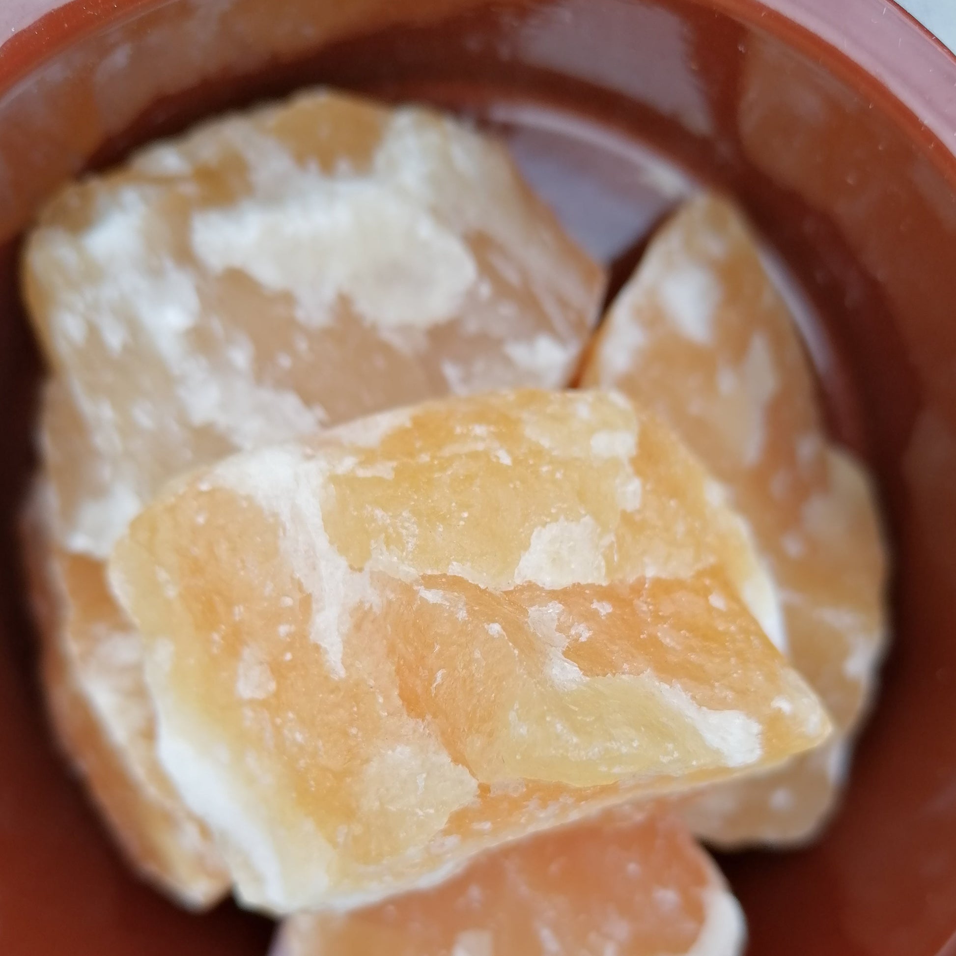 large orange raw chunks of orange calcite