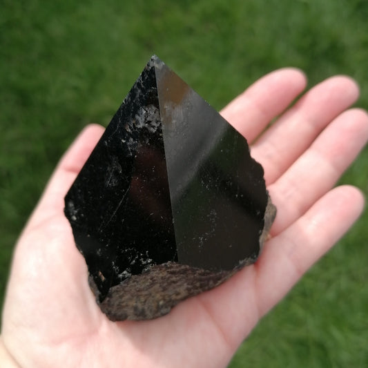 A Large black tourmaline top point polished