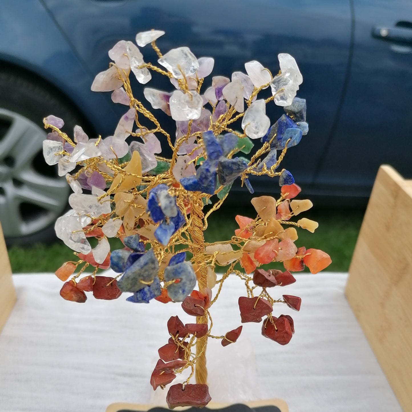 a wire tree with mixed colour chakra crystal chips