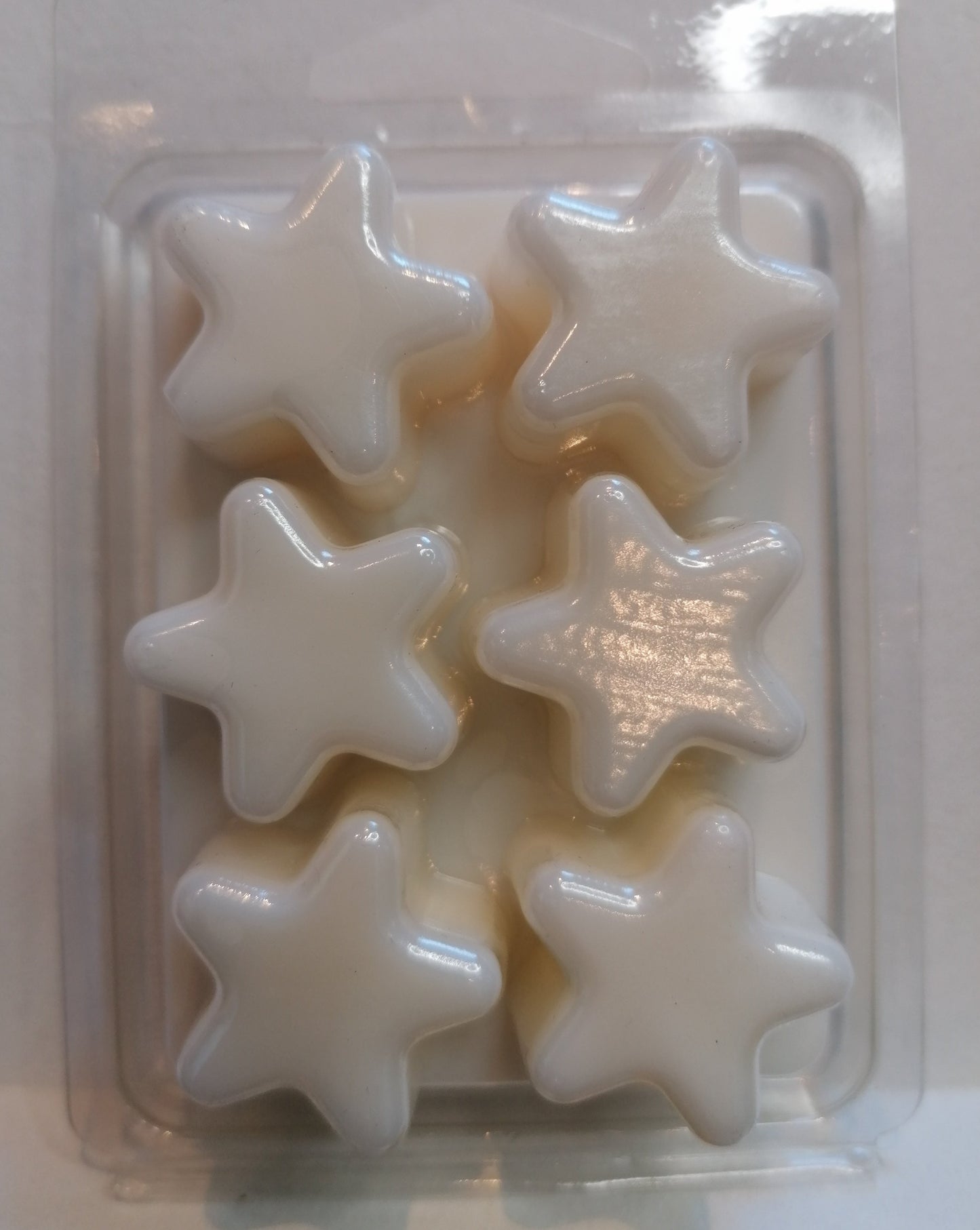 white wax melt in star clamshell