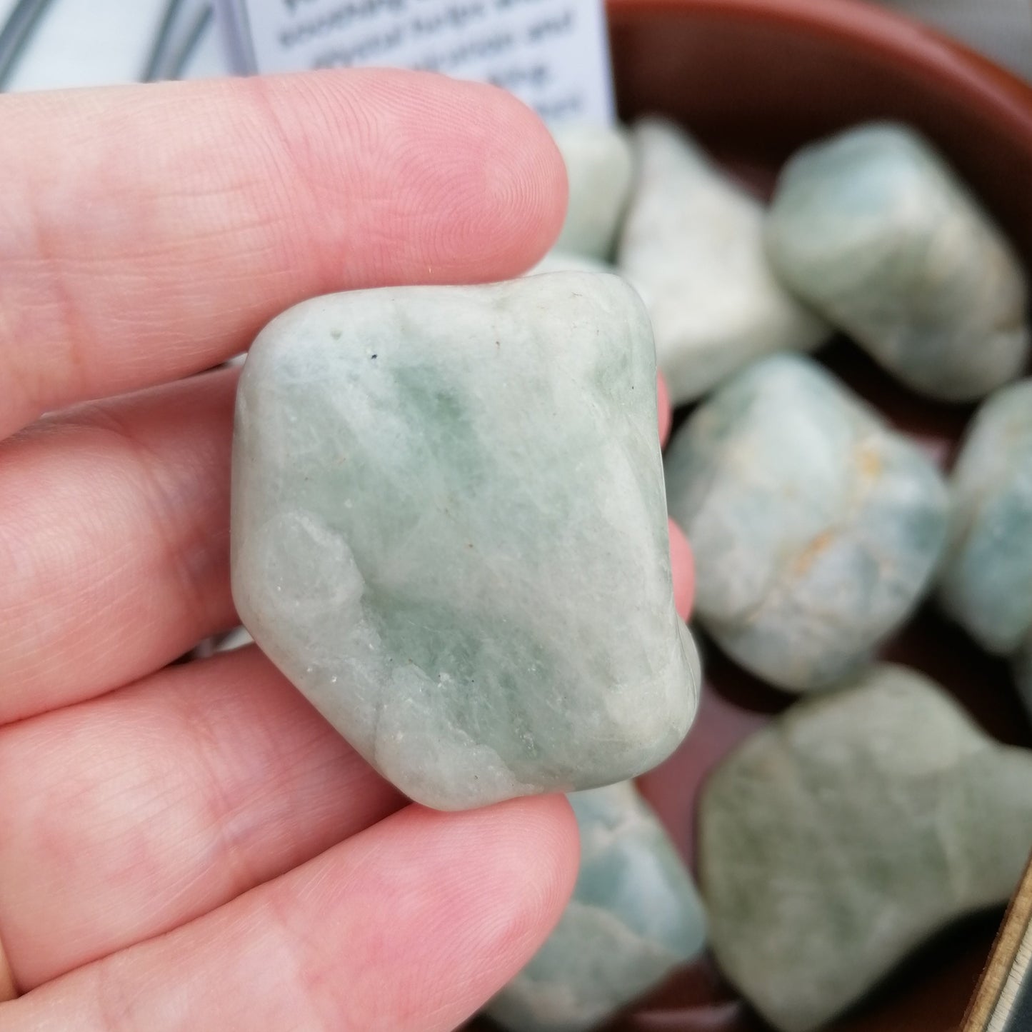 A light green aquamarine crystal tumblestone