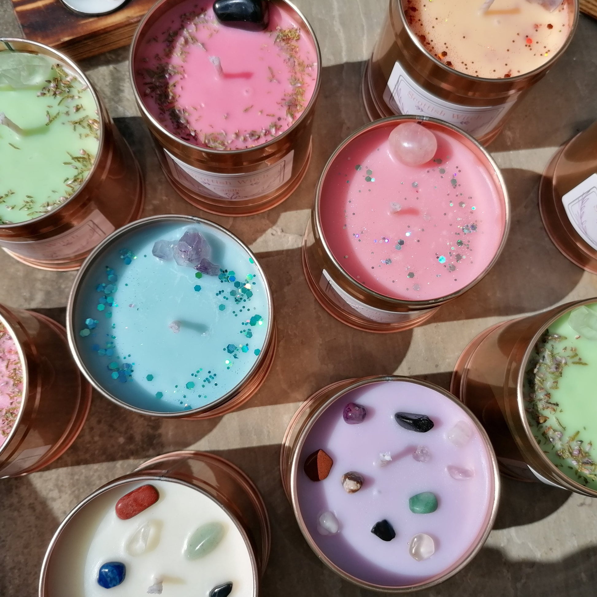 a selection of colourful crystal candles