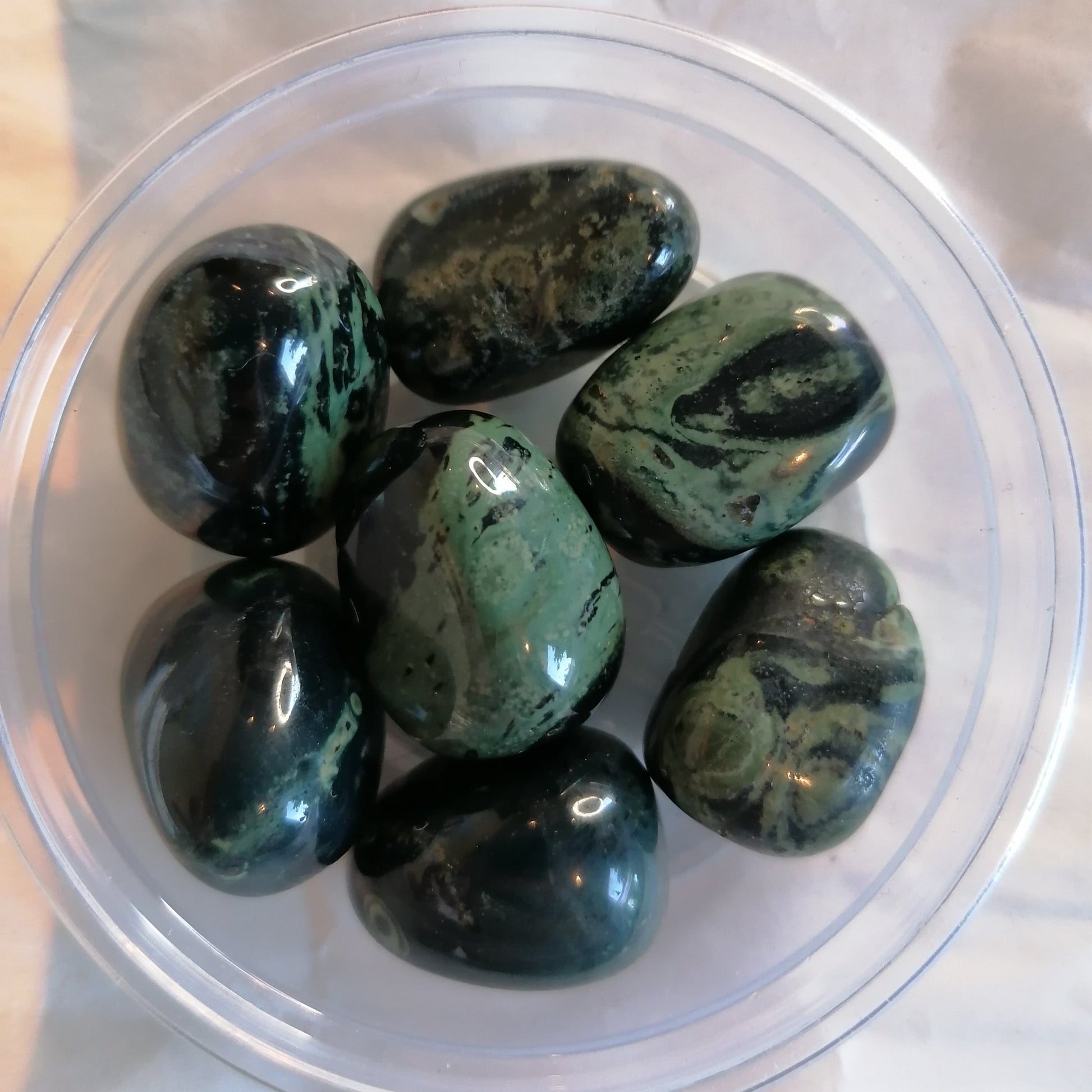 green and black kambaba jasper tumblestone