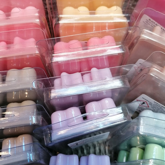 colourful selection of wax melts in clamshells