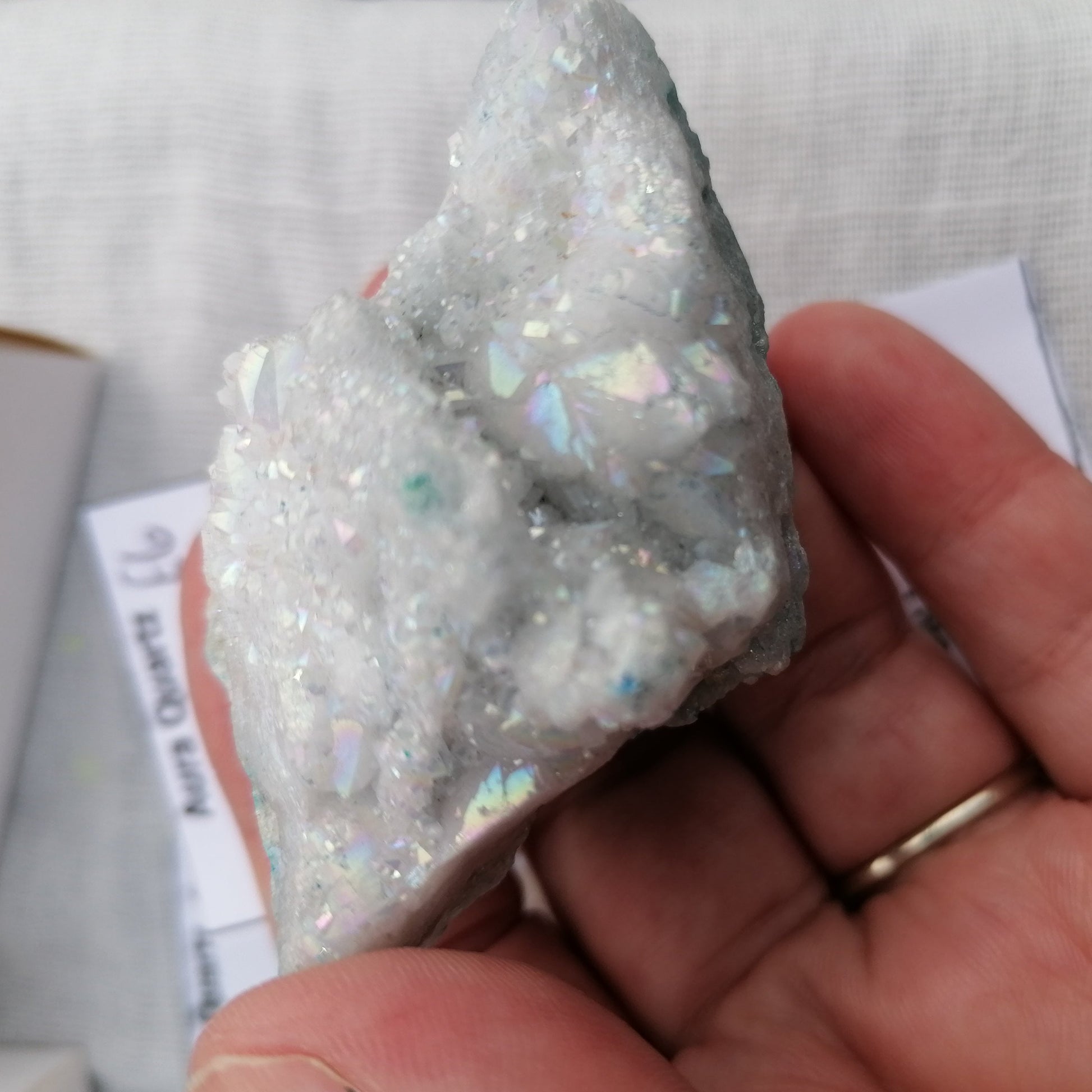 a light blue aura quartz druzy with rainbow shine