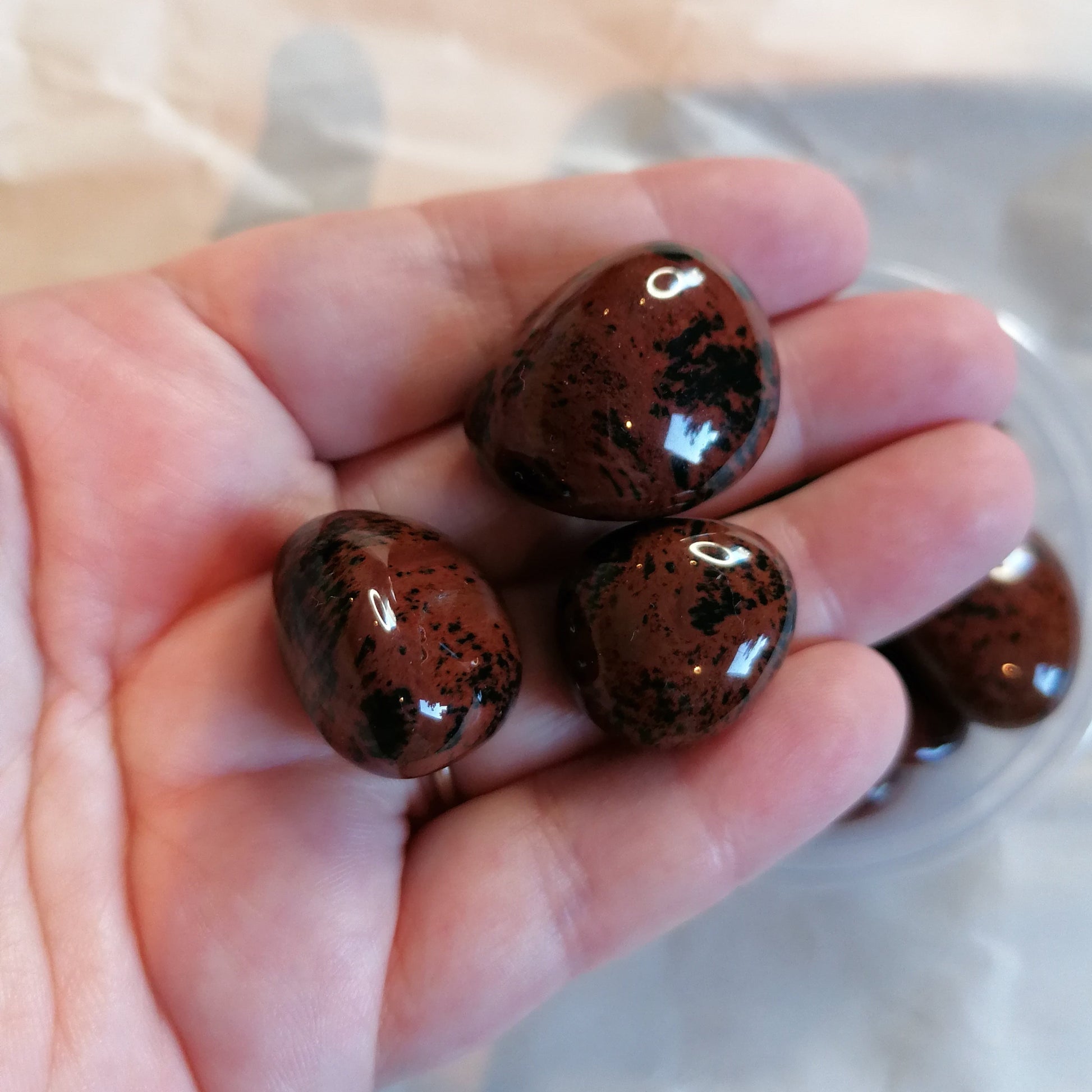 burgundy and black mahogany obsidian tumblestones