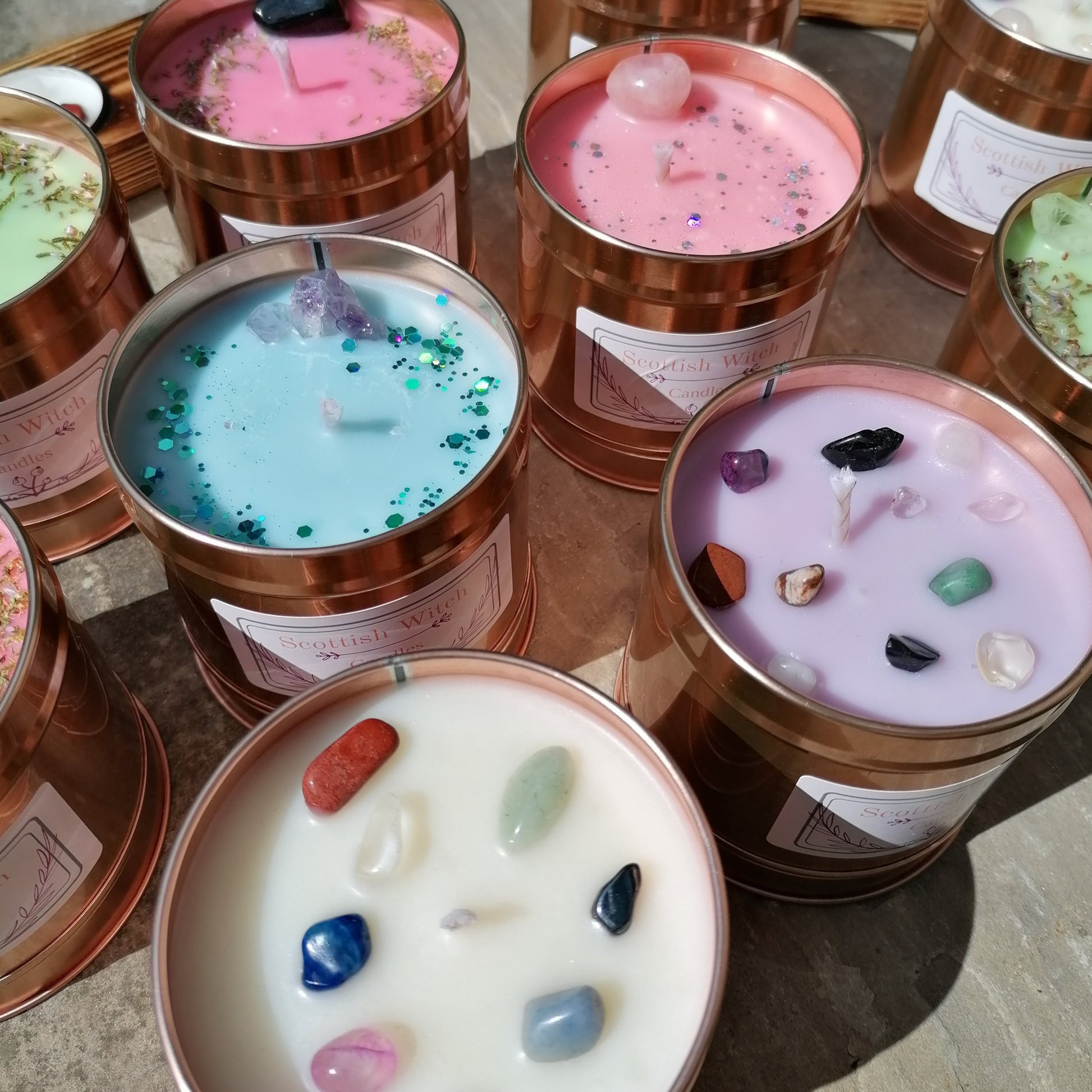 selection of colourful crystal candles