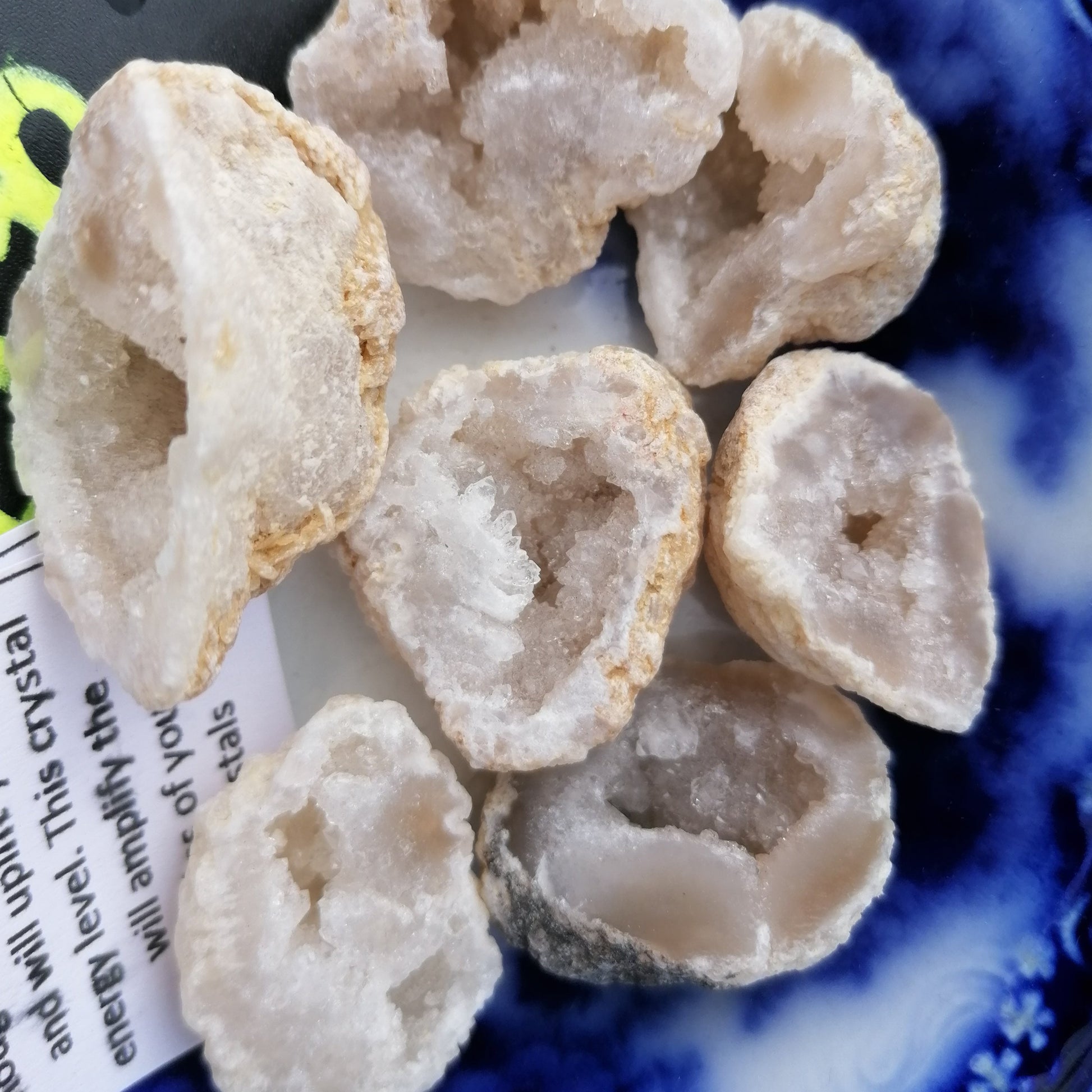 Half a white quartz druzy geode cut and polished