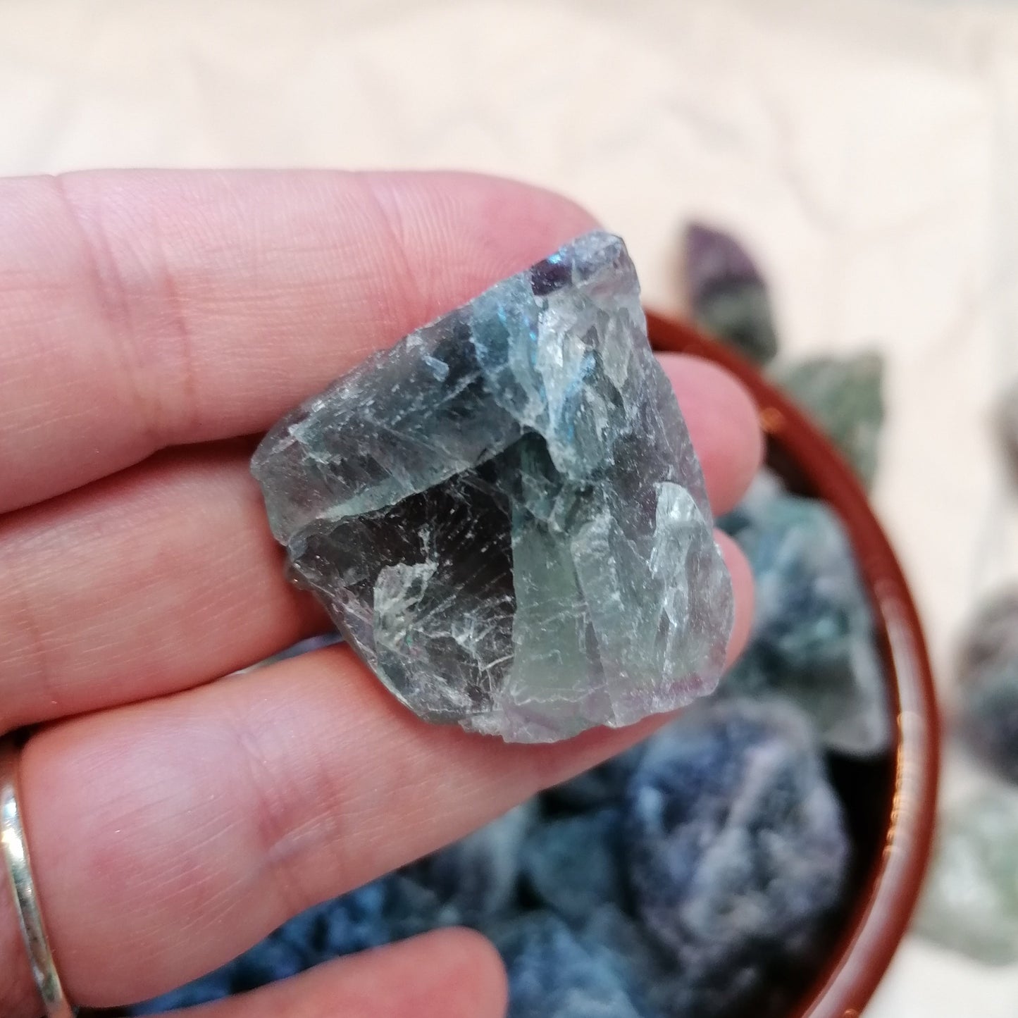 green white and purple raw fluorite chunks